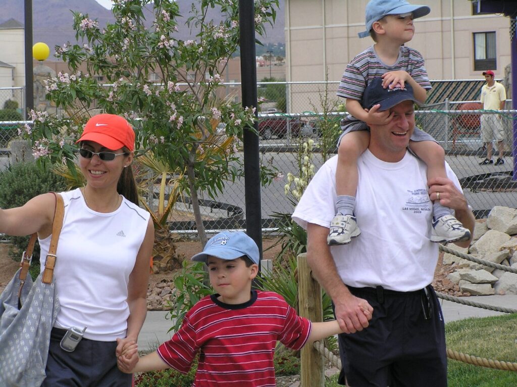 a young family of four enjoying outdoor activities at Bob-O's