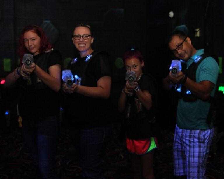 a family enjoying a game of laser tag