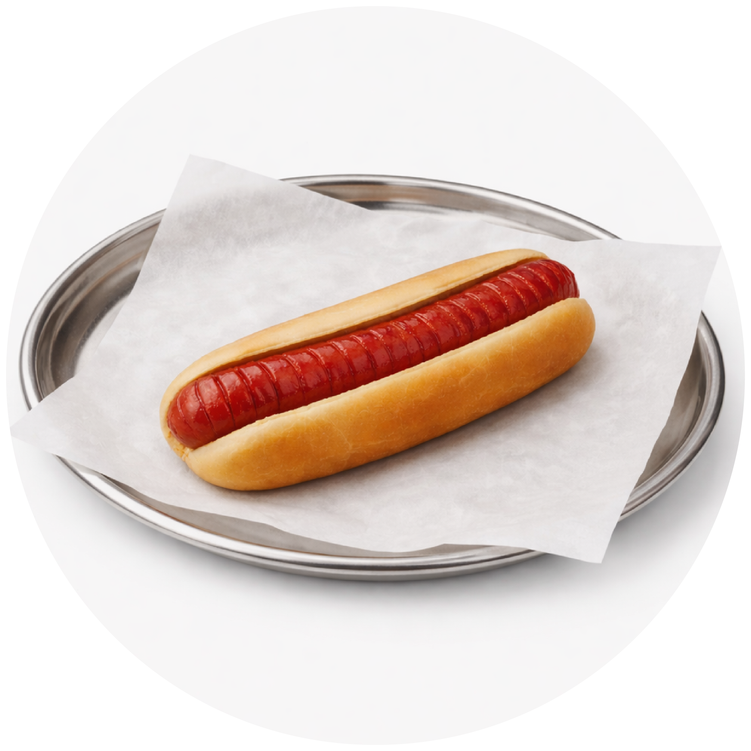 A single grilled hot dog in a soft bun, served on white parchment paper atop a stainless steel plate against a clean white background.