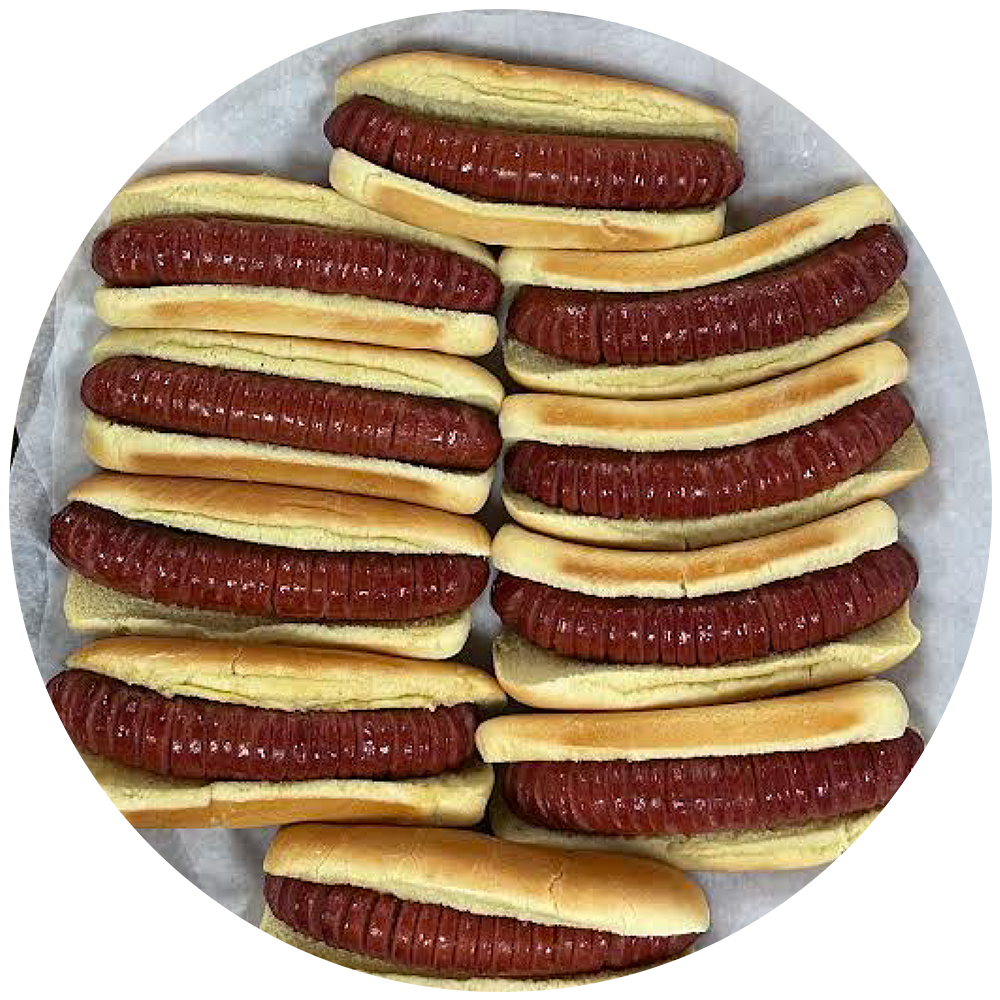 Plate of hot dogs in buns arranged in a circular stack